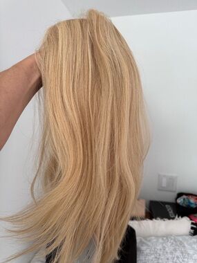 Creamy blonde human hair wig with all hand tied cap from Jon Renau